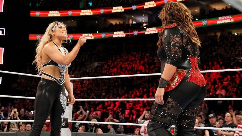 Beth Phoenix and Nia Jax, two of the most dominant women in history, battling as the fans were chanting